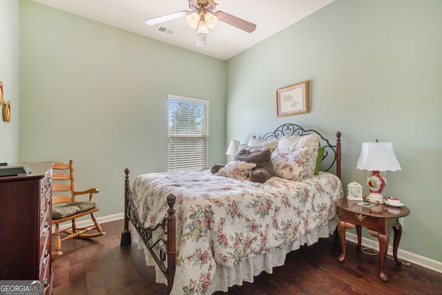 307 Montgomery Way, Woodstock, GA 30188 - bedroom featuring baseboards, dark wood-style flooring, and a ceiling fan