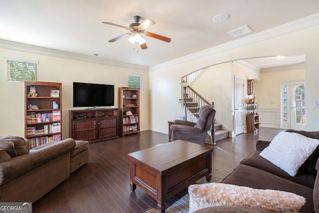 307 Montgomery Way, Woodstock, GA 30188 - living area with stairs, ceiling fan, ornamental molding, dark wood-style flooring, and arched walkways