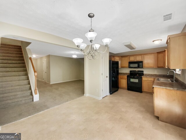 1005 Magnolia Gardens Walk, Mcdonough, GA 30253 - kitchen with a sink, a chandelier, open floor plan, visible vents, and black appliances
