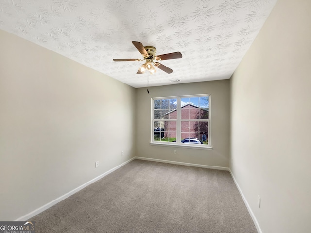 1005 Magnolia Gardens Walk, Mcdonough, GA 30253 - spare room with baseboards, carpet flooring, a textured ceiling, and ceiling fan