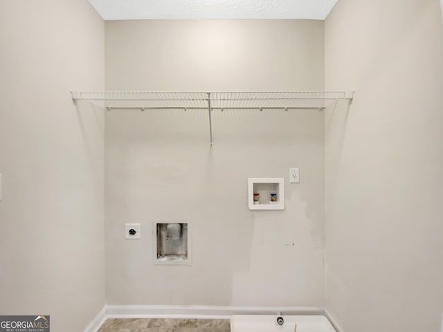 1005 Magnolia Gardens Walk, Mcdonough, GA 30253 - laundry area with electric dryer hookup, baseboards, laundry area, and washer hookup