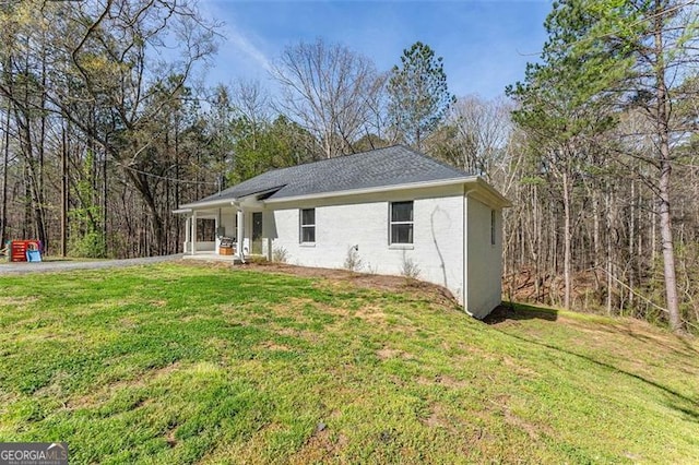 2374 Buchanan Hwy, Dallas, GA 30157 - ranch-style house featuring roof with shingles and a front lawn
