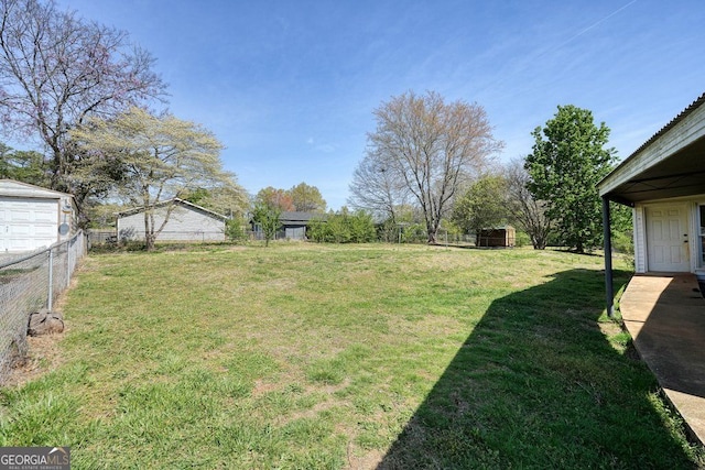view of yard featuring fence
