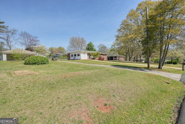 view of front of home with a front yard