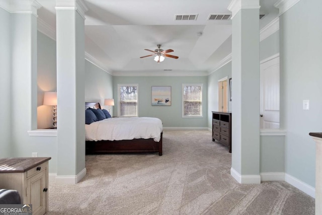 bedroom featuring ornate columns, carpet flooring, and ornamental molding
