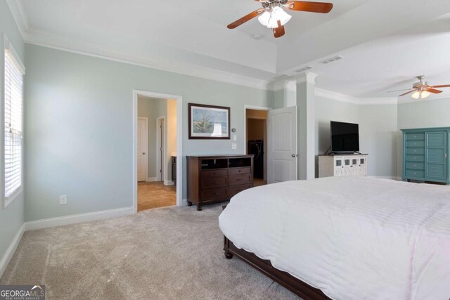 carpeted bedroom featuring crown molding, visible vents, baseboards, and multiple windows
