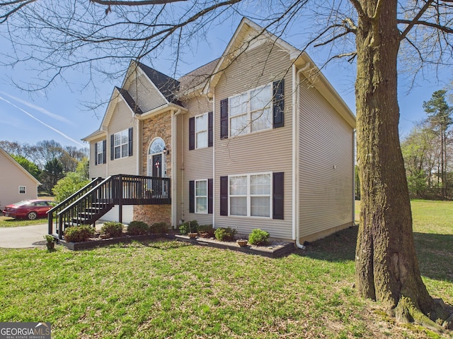 135 Grist Mill Ln SE, Calhoun, GA 30701 - bi-level home with stairs and a front yard