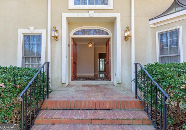 115 Flagstop Run, Fayetteville, GA 30215 - doorway to property with stucco siding