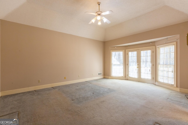 115 Flagstop Run, Fayetteville, GA 30215 - spare room featuring light carpet, a ceiling fan, a textured ceiling, and vaulted ceiling