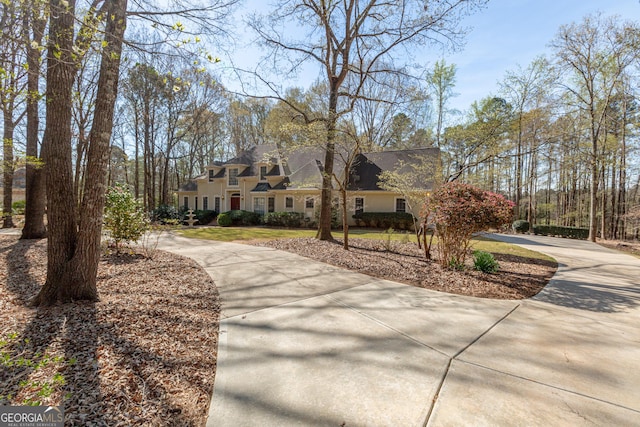 115 Flagstop Run, Fayetteville, GA 30215 - view of front facade featuring curved driveway