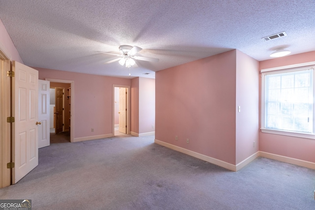 115 Flagstop Run, Fayetteville, GA 30215 - carpeted spare room with ceiling fan and a textured ceiling