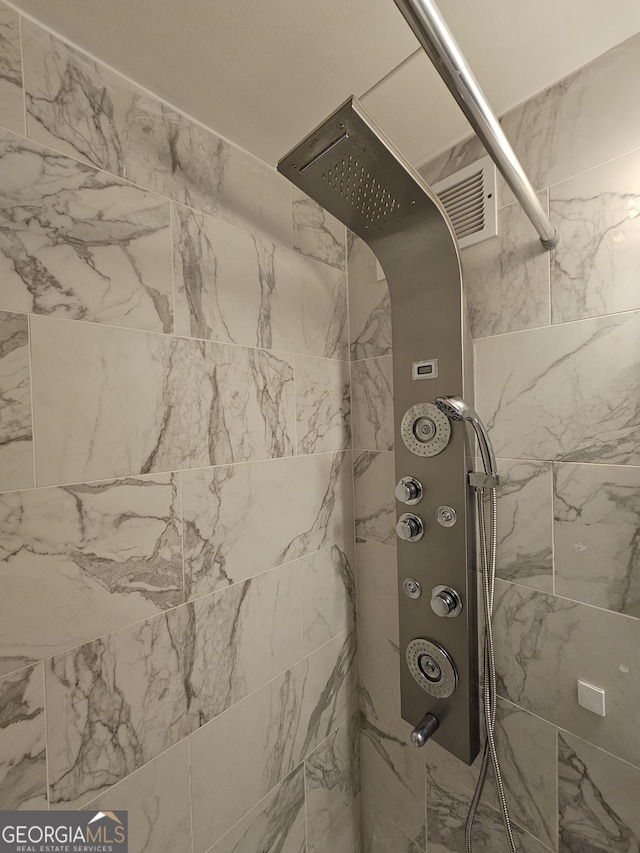 215 Piedmont Ave NE Unit 304, Atlanta, GA 30308 - interior details with a tile shower