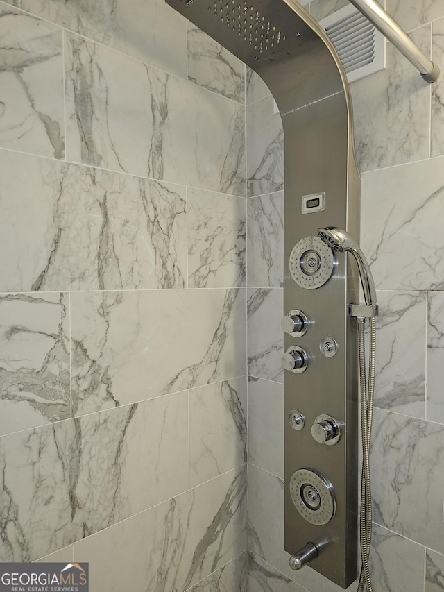 215 Piedmont Ave NE Unit 304, Atlanta, GA 30308 - room details featuring tiled shower