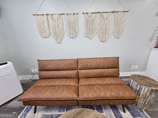 215 Piedmont Ave NE Unit 304, Atlanta, GA 30308 - sitting room featuring baseboards and wood finished floors