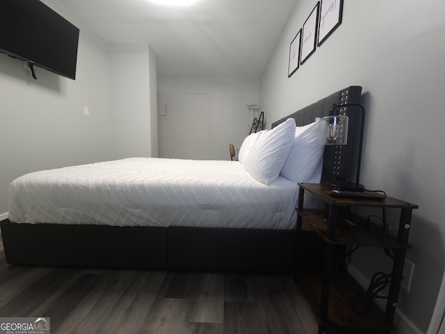 215 Piedmont Ave NE Unit 304, Atlanta, GA 30308 - bedroom with baseboards and wood finished floors