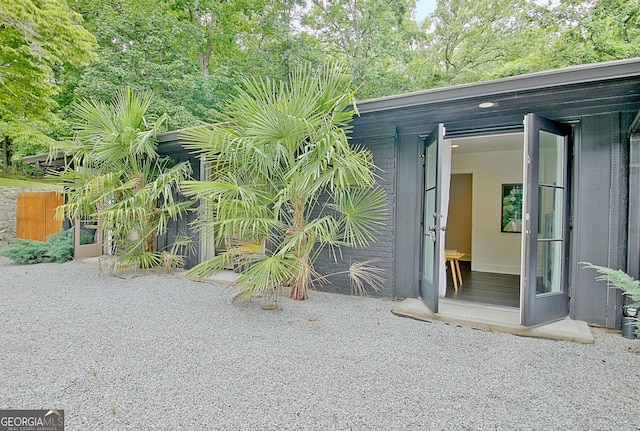 view of outdoor structure featuring fence