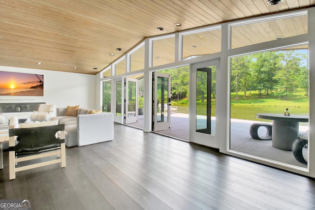 living area featuring expansive windows, wood finished floors, recessed lighting, and wood ceiling