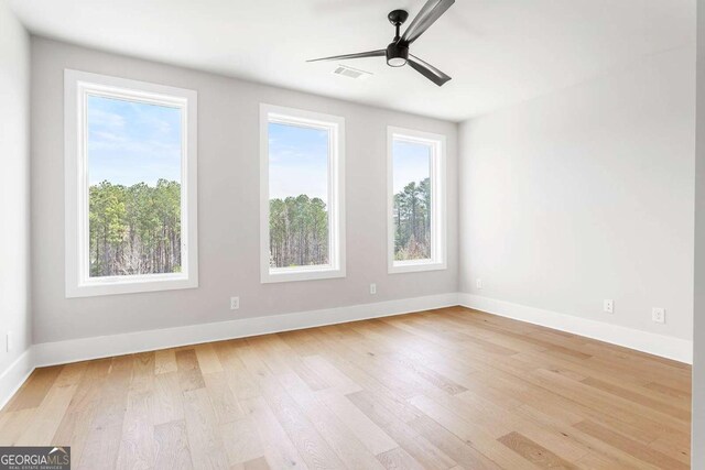 7110 Summit Pl, Alpharetta, GA 30009 - spare room with light wood-type flooring, baseboards, and a ceiling fan