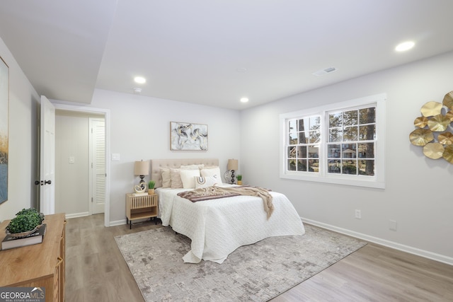 1749 Lauranceae Way, Riverdale, GA 30296 - bedroom featuring baseboards, wood finished floors, and recessed lighting