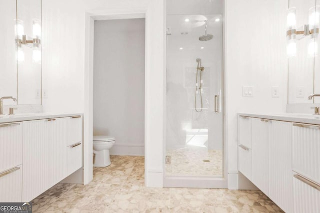 1718 Barnesdale Way NE, Atlanta, GA 30309 - bathroom featuring a stall shower and two vanities