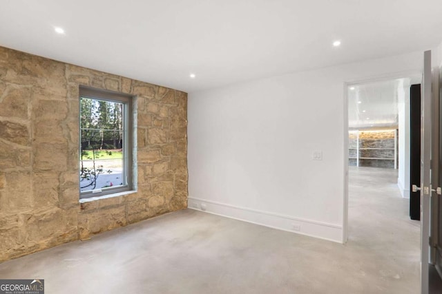 1718 Barnesdale Way NE, Atlanta, GA 30309 - spare room featuring concrete floors and recessed lighting