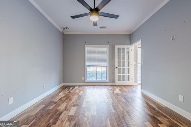 2921 Lenox Rd NE Unit 113, Atlanta, GA 30324 - unfurnished room featuring ornamental molding, a ceiling fan, and wood finished floors