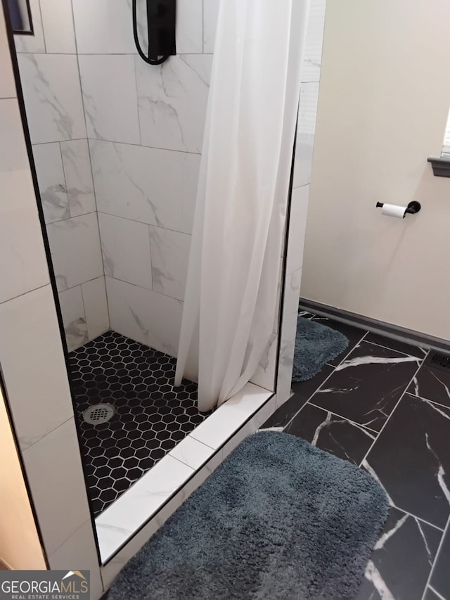 2565 Cloud, Decatur, GA 30034 - bathroom with marble finish flooring and a stall shower