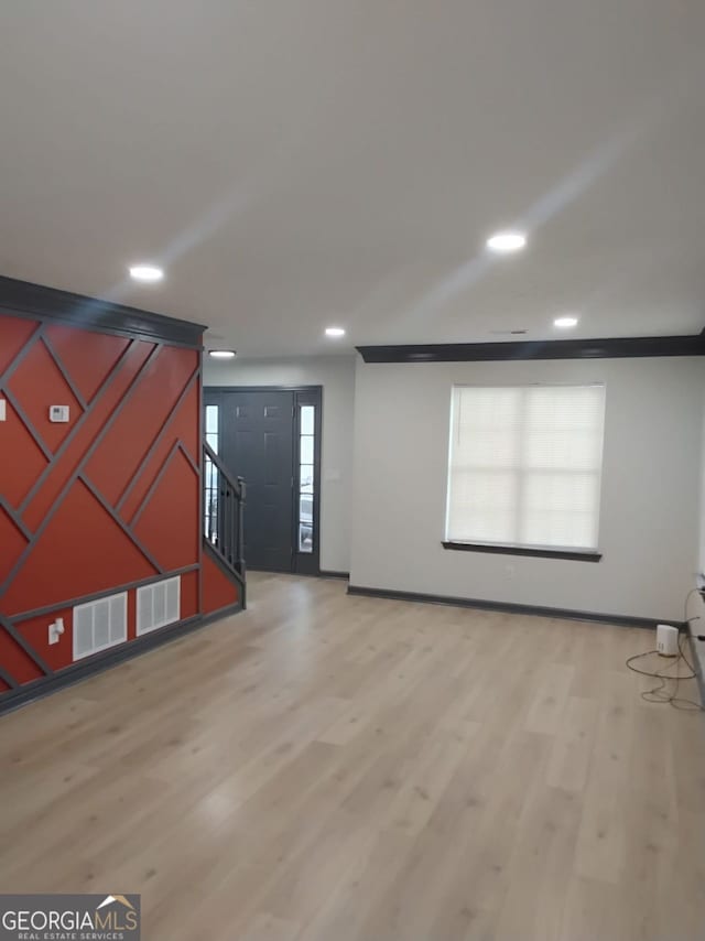 2565 Cloud, Decatur, GA 30034 - unfurnished living room with light wood-style floors, recessed lighting, stairs, and baseboards