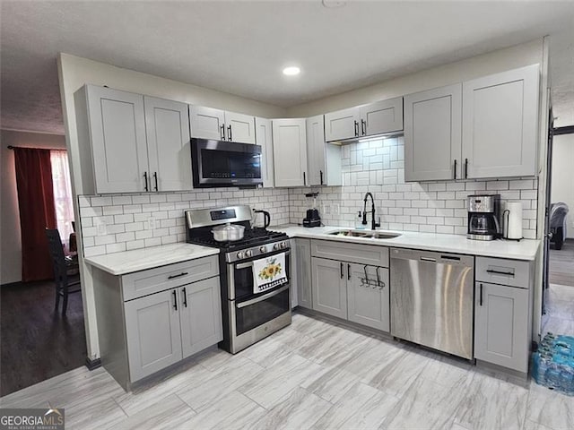 2565 Cloud, Decatur, GA 30034 - kitchen with appliances with stainless steel finishes, gray cabinets, a sink, and light countertops