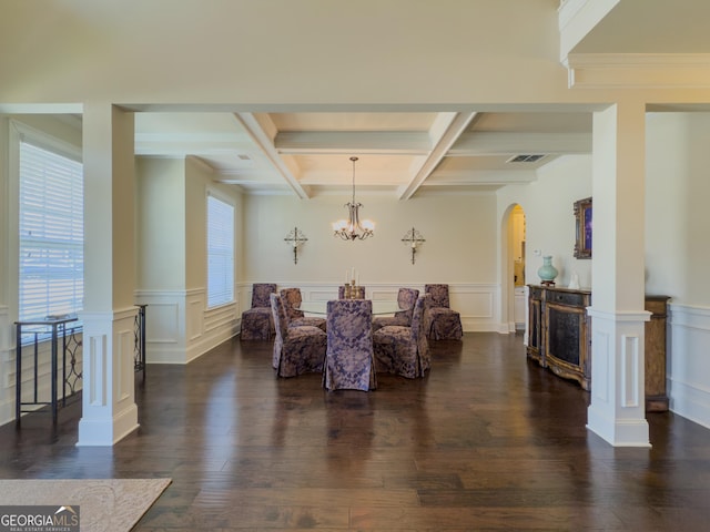 dining space featuring beamed ceiling, visible vents, a wealth of natural light, and coffered ceiling