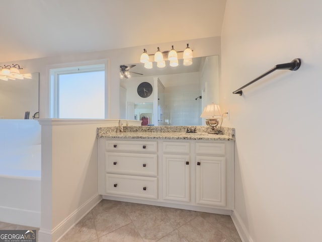 bathroom featuring baseboards, ceiling fan, tile patterned floors, and a tile shower