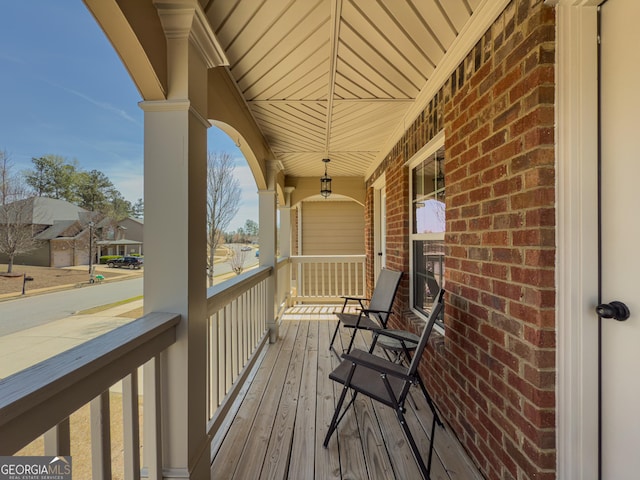 wooden deck featuring covered porch