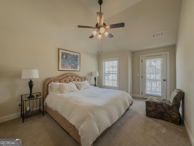 bedroom featuring baseboards, visible vents, access to exterior, and light colored carpet