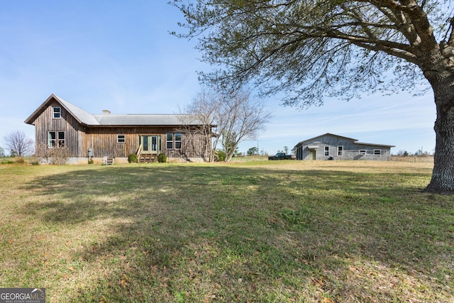 1725 Watermelon Rd, Tennille, GA 31089 - exterior space featuring a front yard