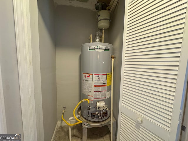 710 Bluebird Dr SE, Conyers, GA 30094 - utility room featuring water heater