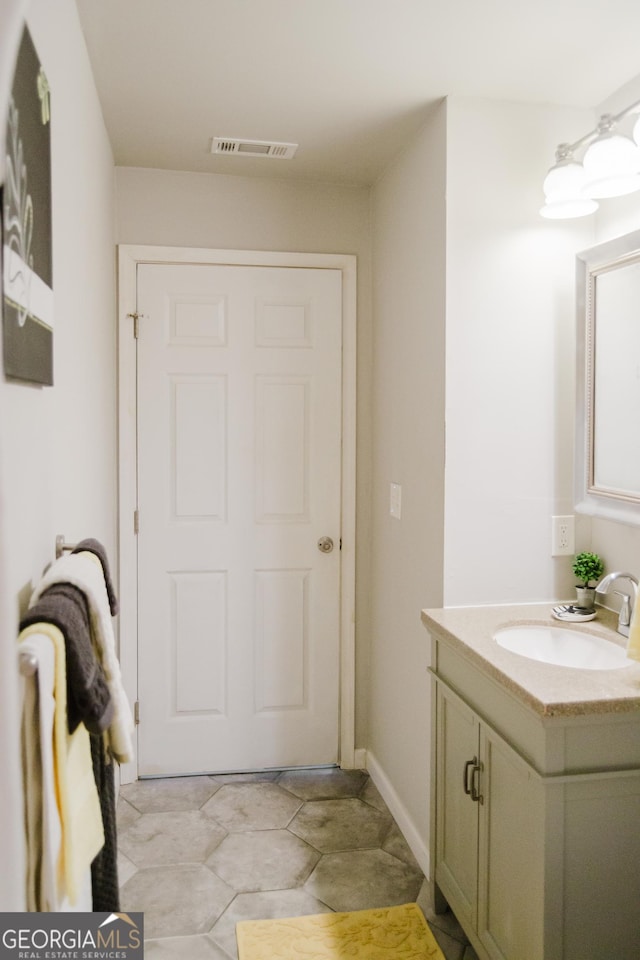 710 Bluebird Dr SE, Conyers, GA 30094 - bathroom with vanity and visible vents