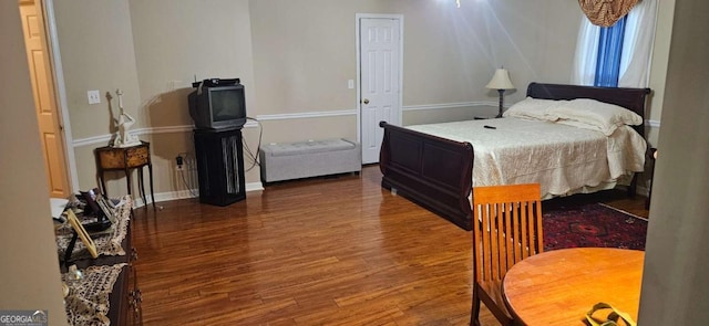 3715 Millers Pond Way, Snellville, GA 30039 - bedroom with baseboards and wood finished floors