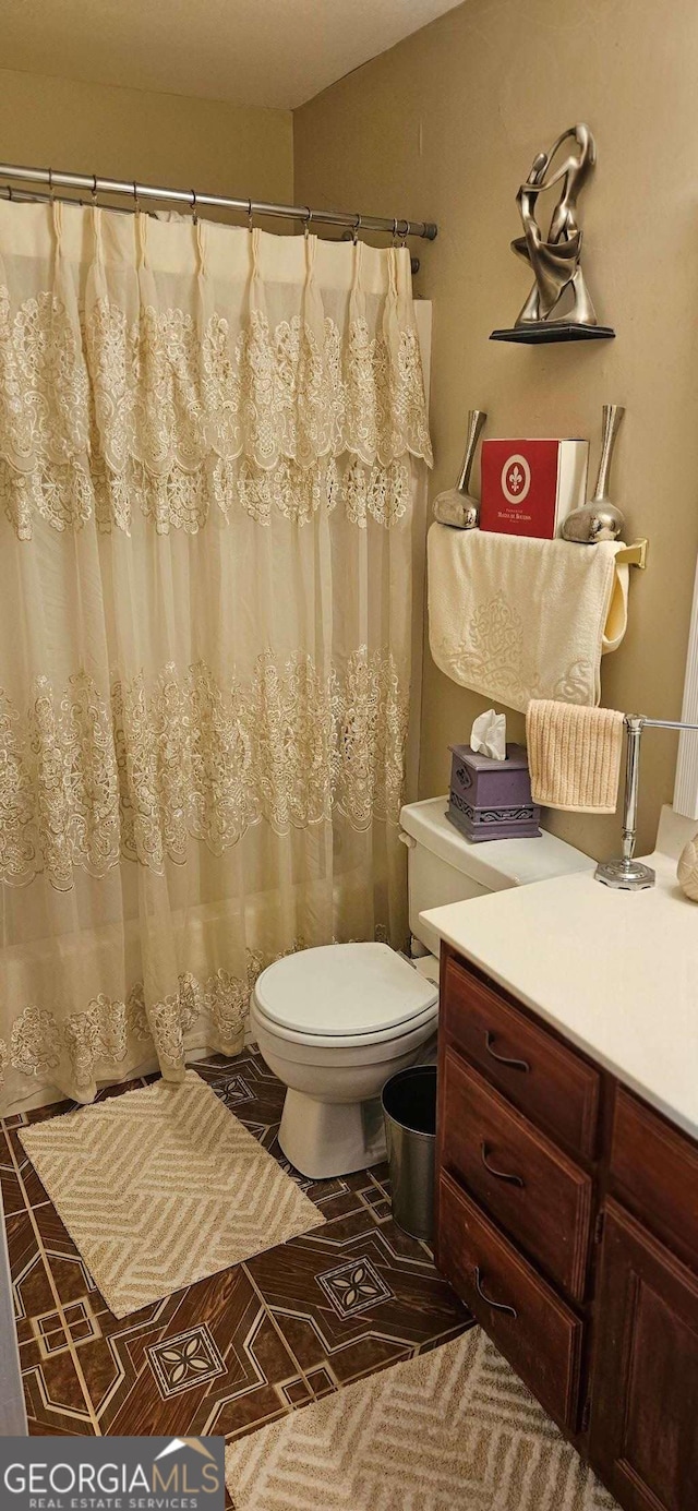 3715 Millers Pond Way, Snellville, GA 30039 - bathroom with toilet, tile patterned flooring, and vanity