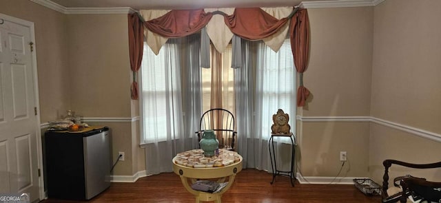 3715 Millers Pond Way, Snellville, GA 30039 - sitting room featuring dark wood-type flooring, baseboards, and crown molding