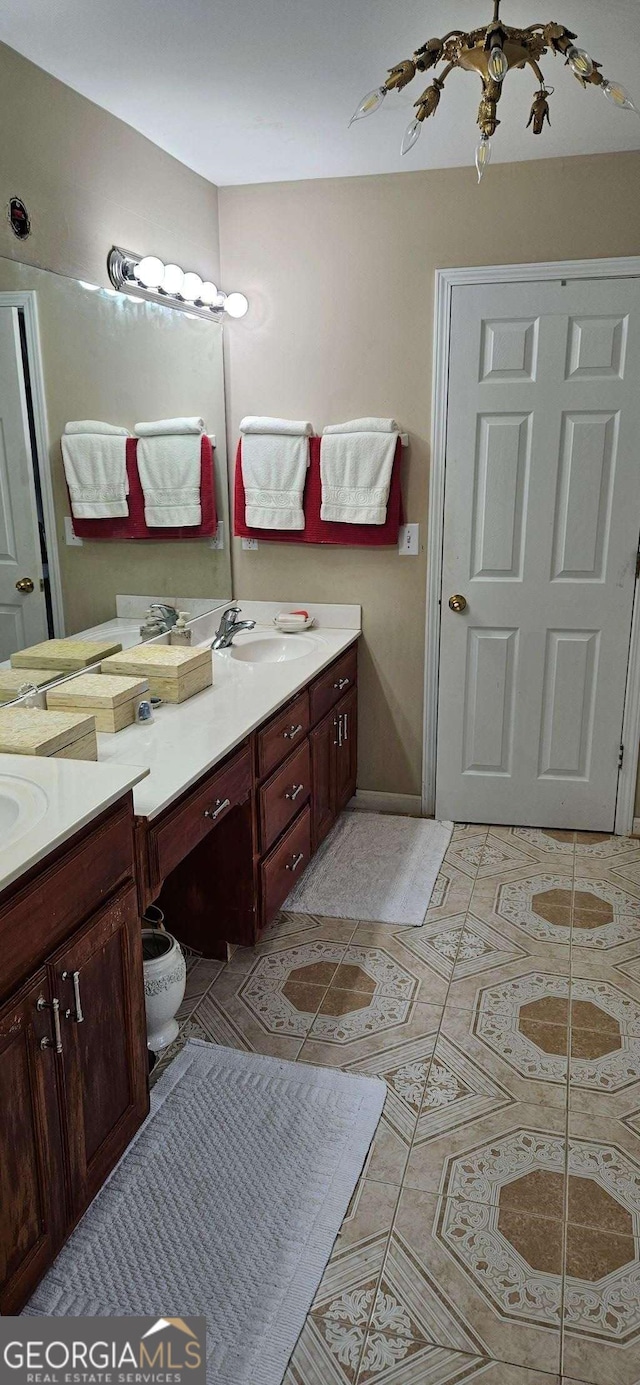 3715 Millers Pond Way, Snellville, GA 30039 - bathroom with tile patterned floors and vanity
