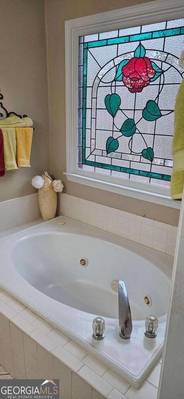 3715 Millers Pond Way, Snellville, GA 30039 - bathroom featuring a tub with jets