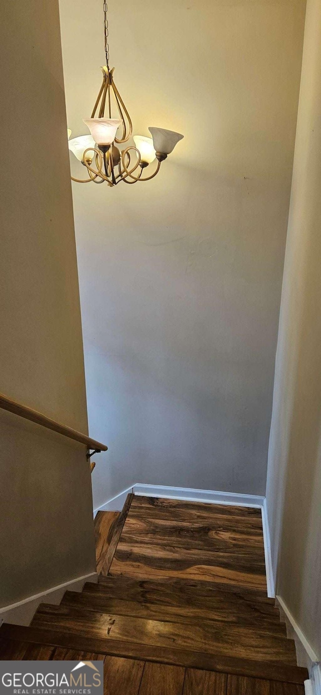 3715 Millers Pond Way, Snellville, GA 30039 - stairs with baseboards, wood finished floors, and a notable chandelier