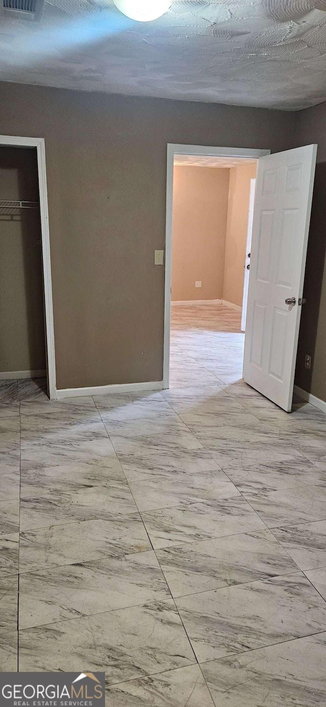 3715 Millers Pond Way, Snellville, GA 30039 - hallway featuring marble finish floor, baseboards, and visible vents