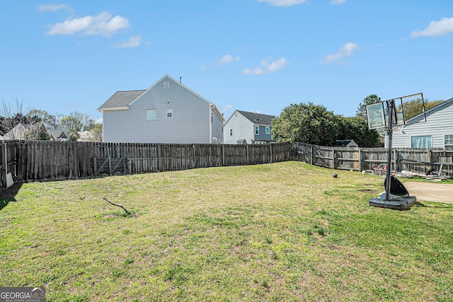 view of yard featuring a fenced backyard