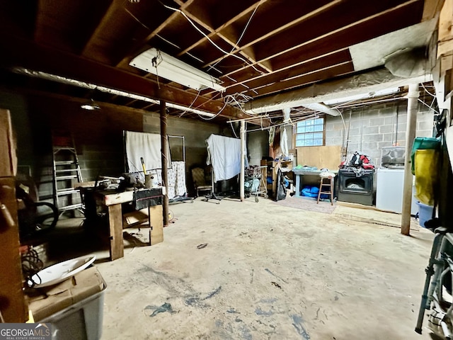 6917 Laurelwood Dr, Douglasville, GA 30135 - basement with washer / dryer and concrete block wall