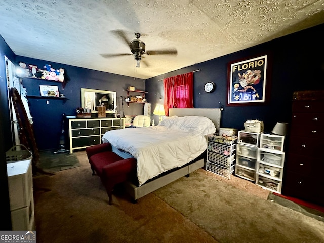 6917 Laurelwood Dr, Douglasville, GA 30135 - carpeted bedroom with a textured ceiling and a ceiling fan