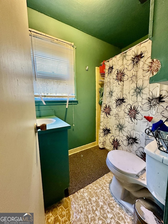 6917 Laurelwood Dr, Douglasville, GA 30135 - bathroom featuring toilet and vanity