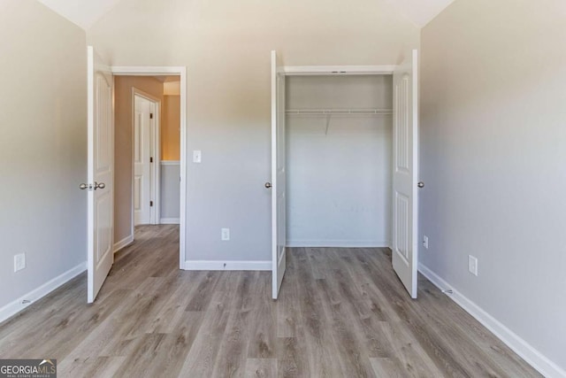 6399 Woodwell Dr, Union City, GA 30291 - unfurnished bedroom featuring light wood-type flooring and a closet