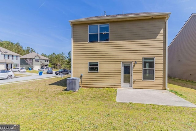 6399 Woodwell Dr, Union City, GA 30291 - rear view of house with a lawn and a patio