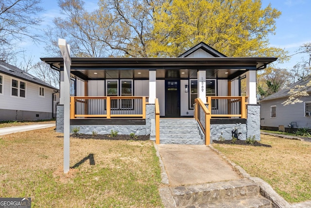 1569 Montreat Ave SW, Atlanta, GA 30311 - view of front of home featuring a front lawn and covered porch